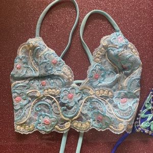 Super sparkly and decorative bra tops.